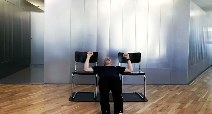 Lat Exercise 7: Reverse Plank Between Two Chairs